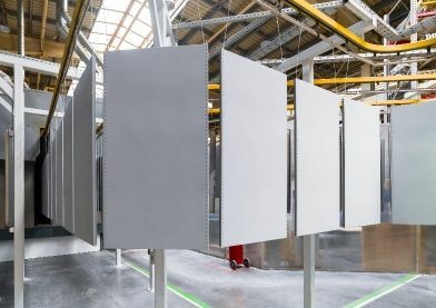 Metal components hanging along a monorail system
