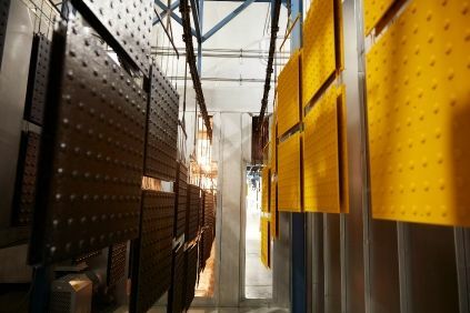 Clean metal components handing to dry in rows